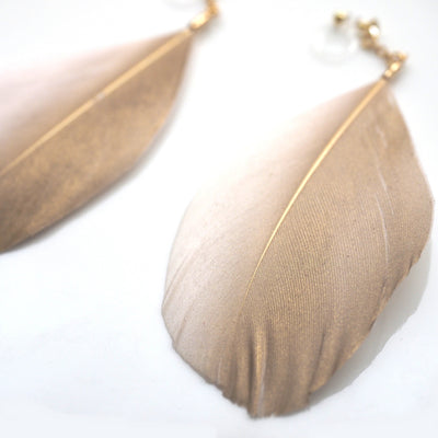 Gold painted pink feather invisible clip on earrings - miyabigracejewelry.com