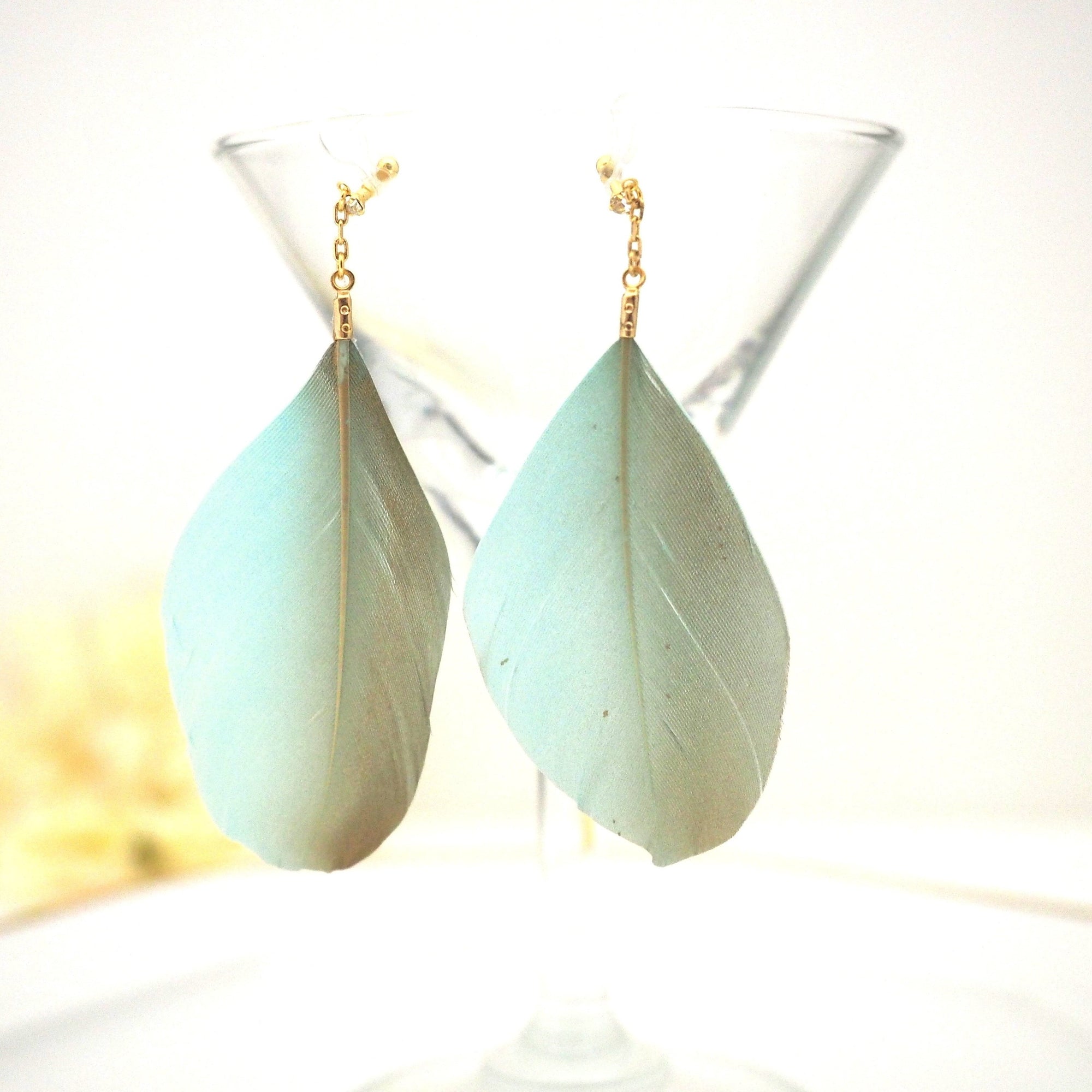 Gold painted green feather invisible clip on earrings - miyabigracejewelry.com
