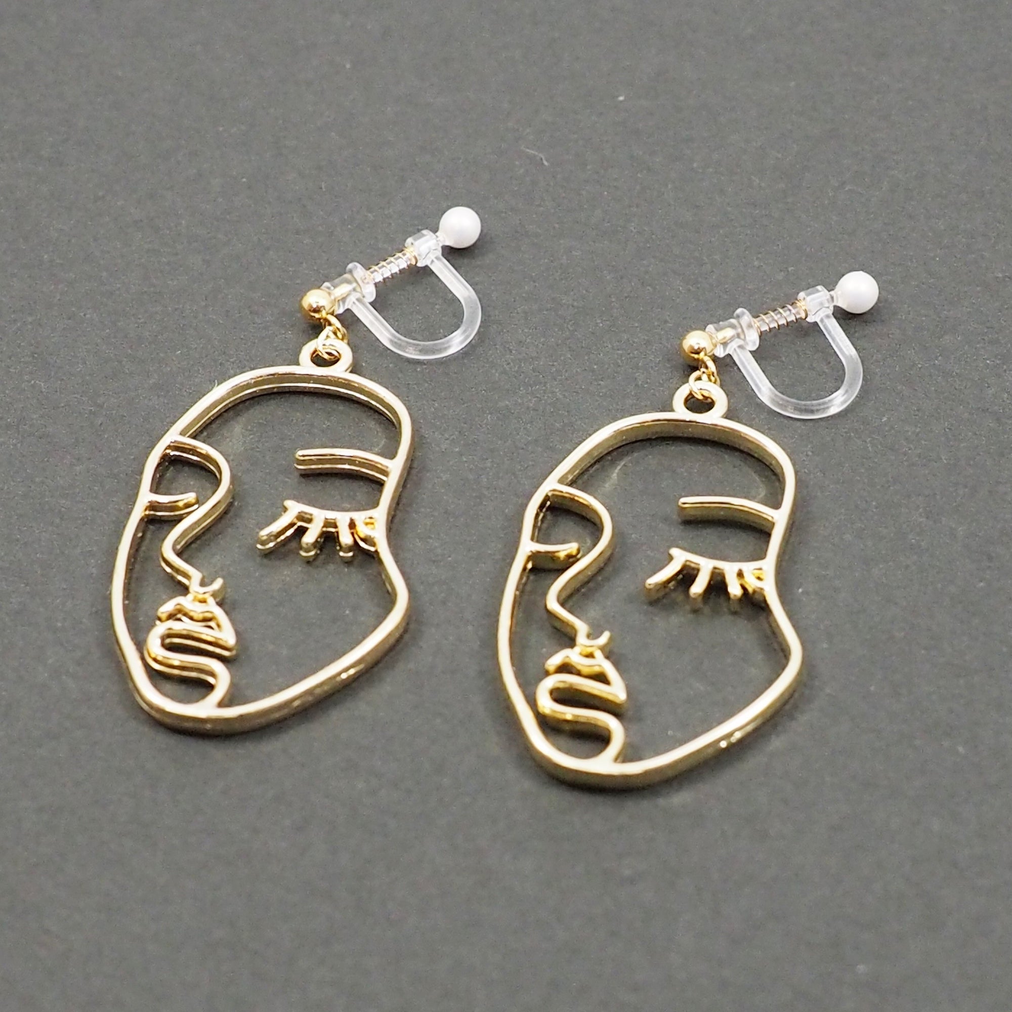 Gold Picasso Face Closed Eyes Invisible Clip On Earrings - Miyabi Grace