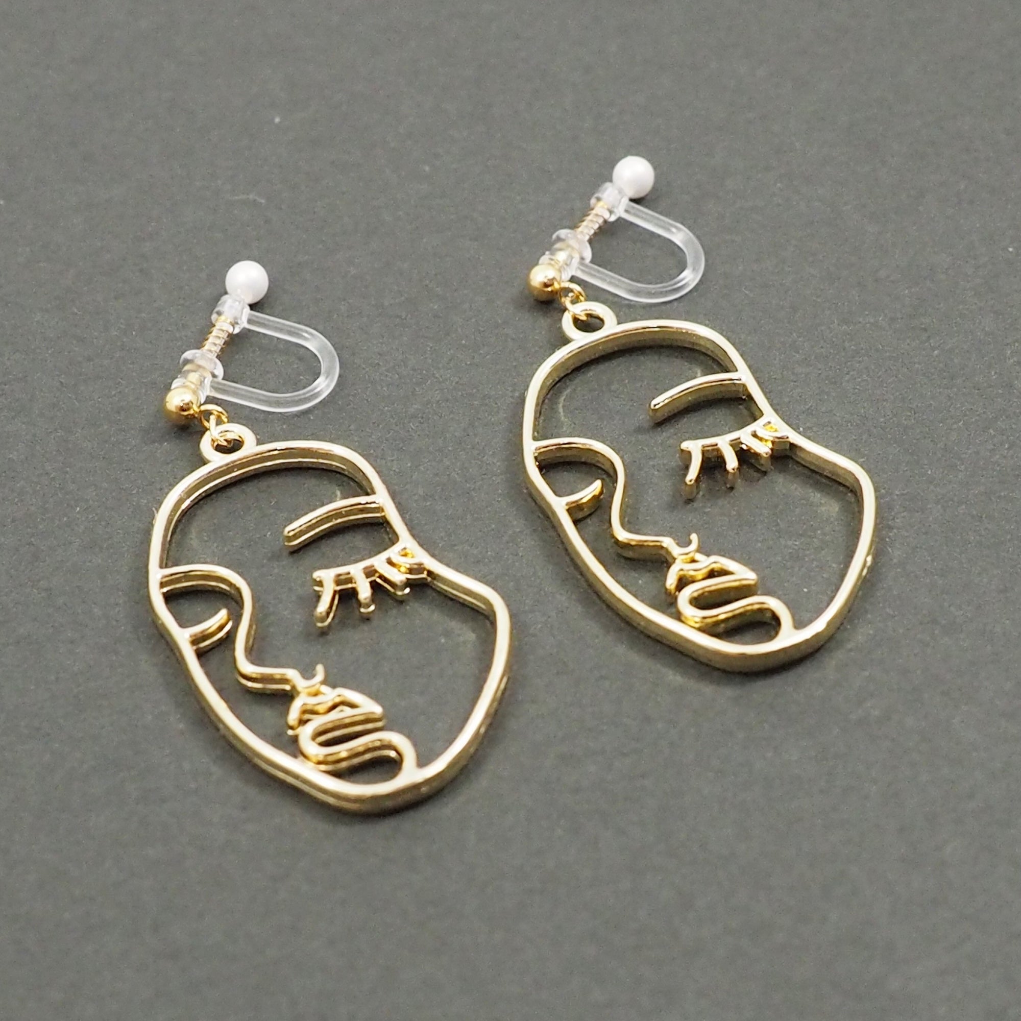 Gold Picasso Face Closed Eyes Invisible Clip On Earrings - Miyabi Grace