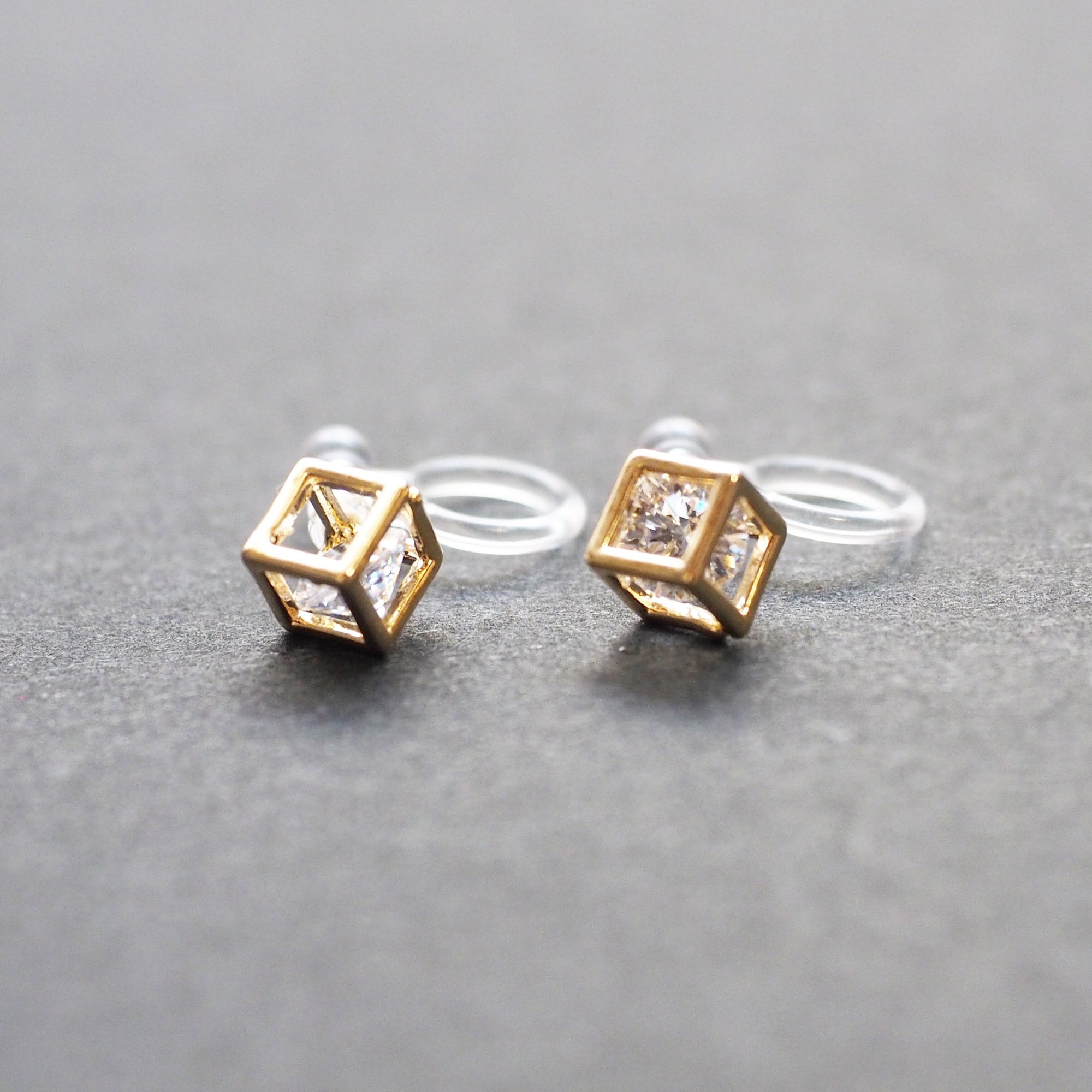 Cubic Zirconia Crystal In Cube Invisible Clip On Stud Earrings ( Gold tone ) - Miyabi Grace