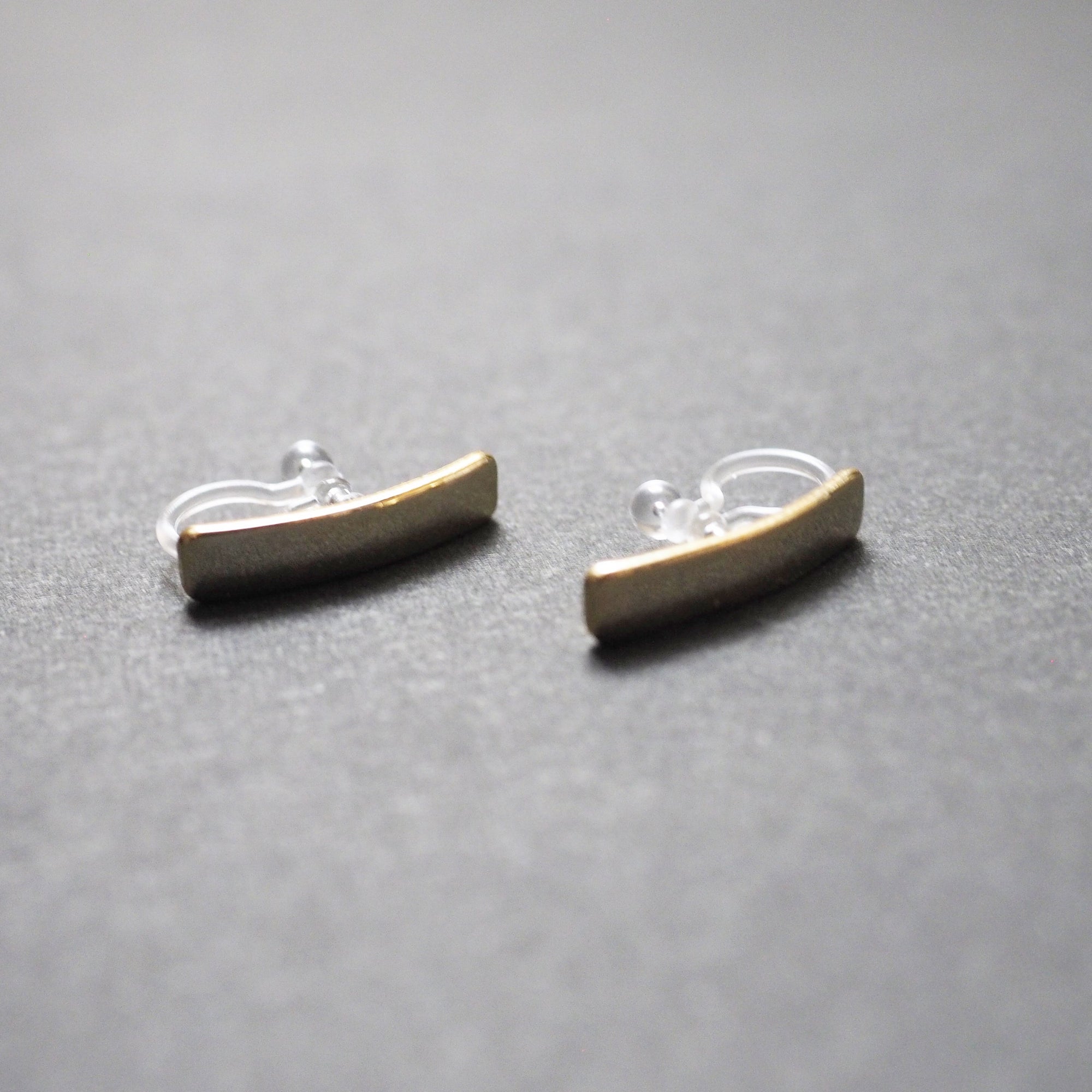 Gold Curved Short Bar Invisible Clip On Stud Earrings