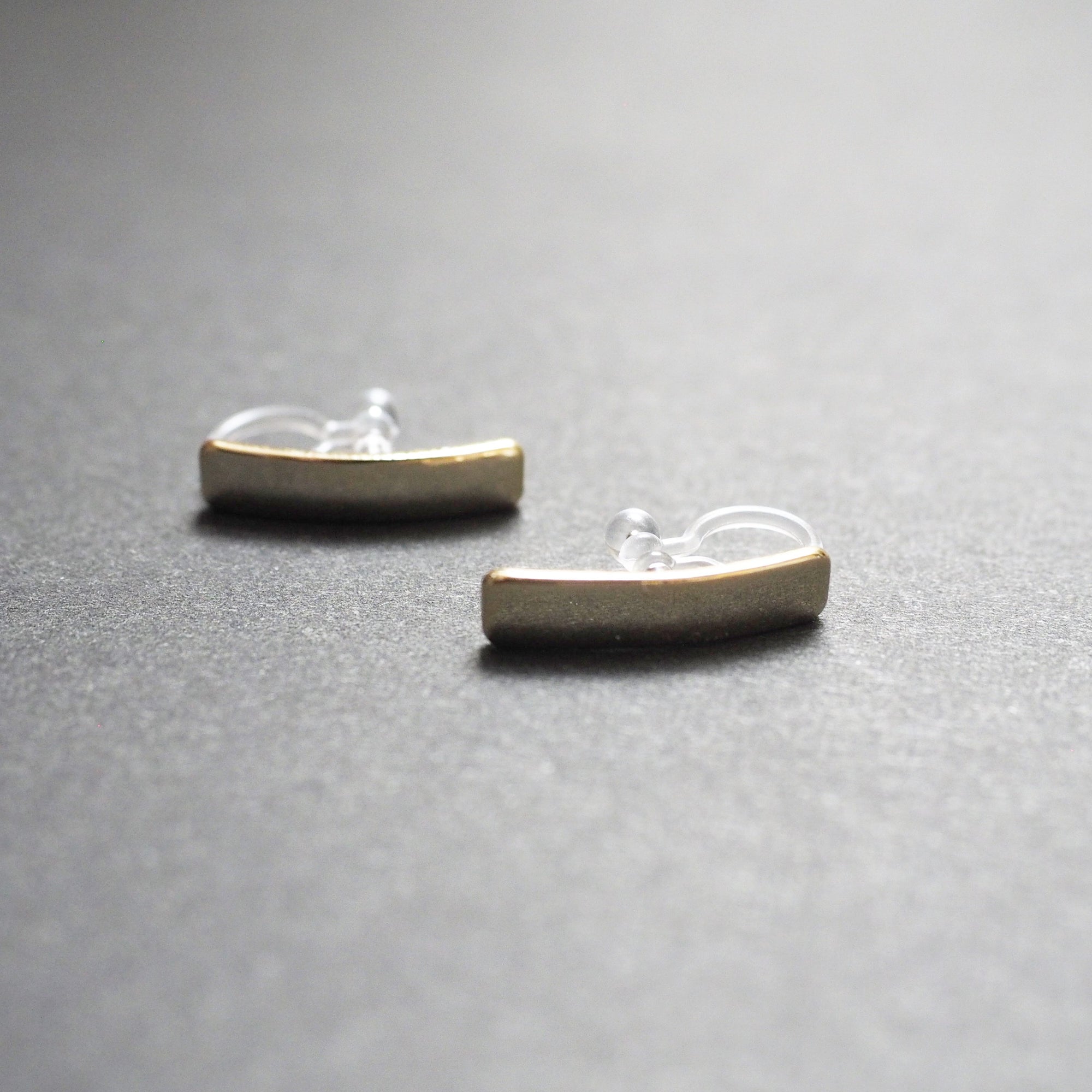 Gold Curved Short Bar Invisible Clip On Stud Earrings