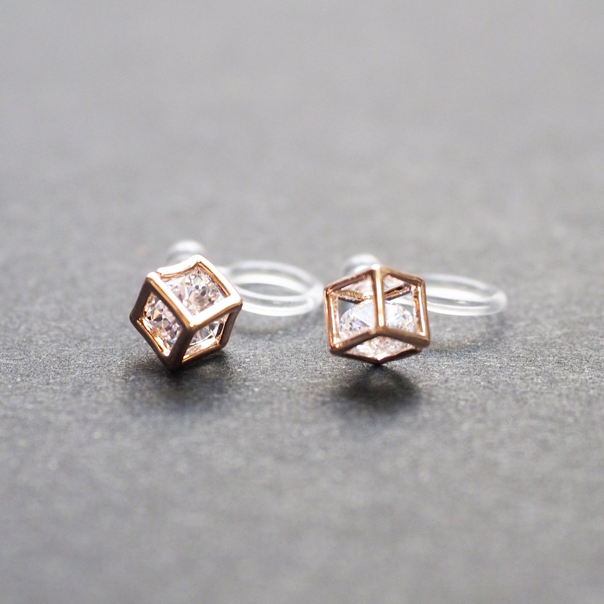 Cubic Zirconia Crystal In Cube Invisible Clip On Stud Earrings ( Rose gold tone ) - Miyabi Grace