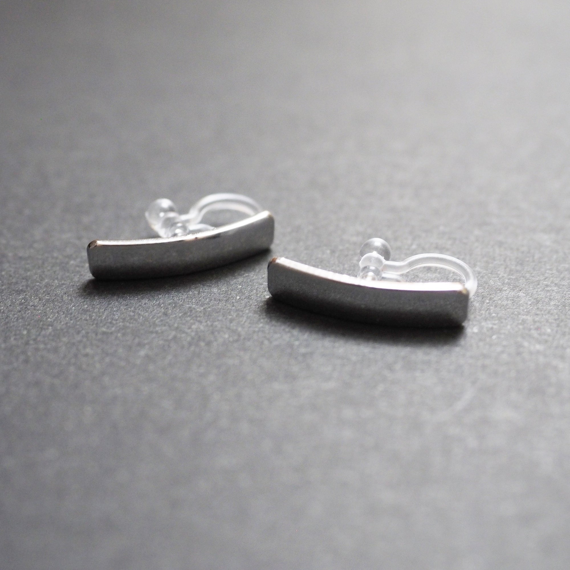 Silver Curved Short Bar Invisible Clip On Stud Earrings