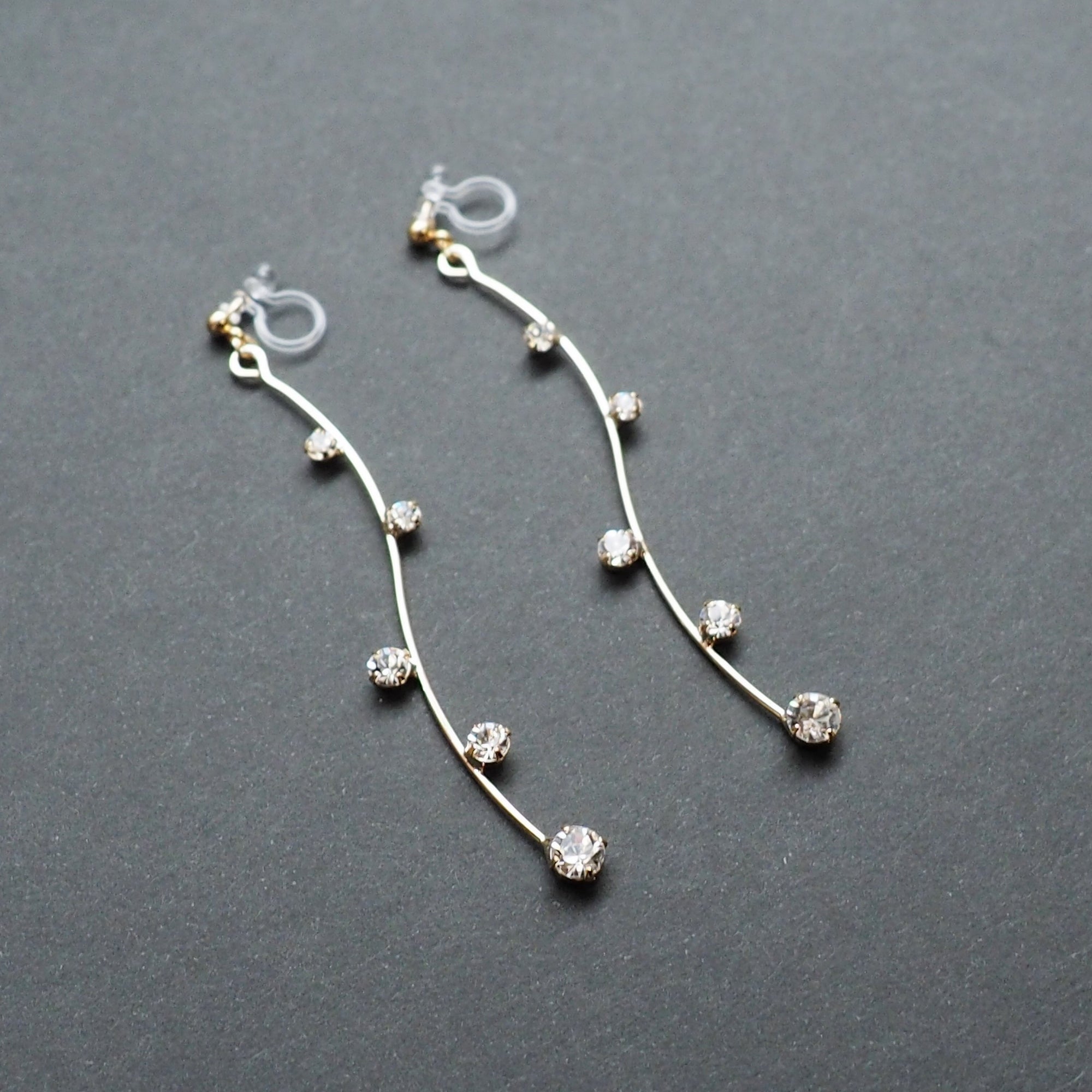 Gold waved bar rhinestone crystal dangle invisible clip on earrings - Miyabi Grace