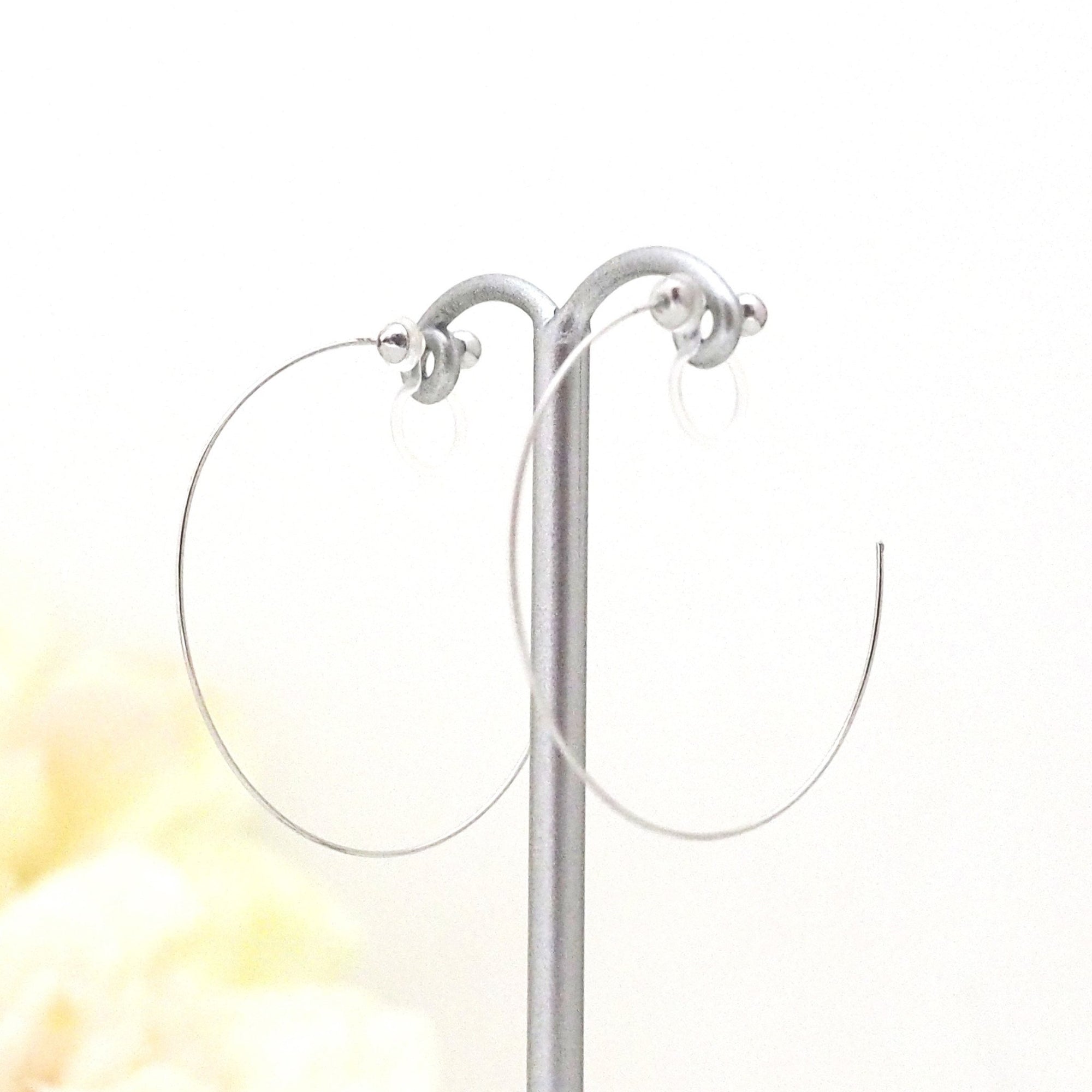 Large silver invisible clip on hoop earrings - miyabigracejewelry.com