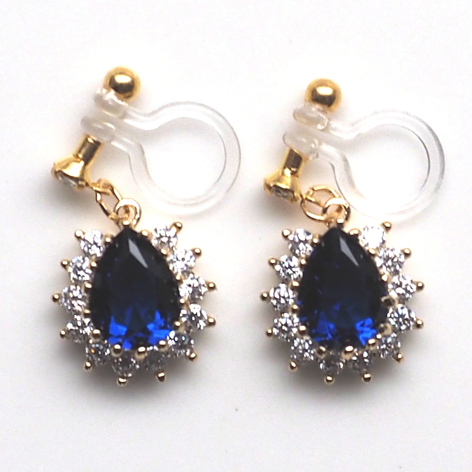 Teardrop navy blue cubic zirconia invisible clip on earrings ( gold tone ) - miyabigracejewelry.com