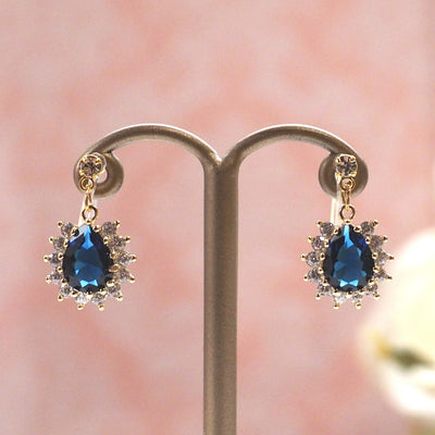Teardrop navy blue cubic zirconia invisible clip on earrings ( gold tone ) - miyabigracejewelry.com