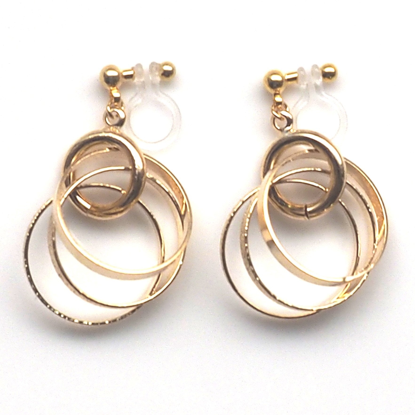 Three metallic gold rings invisible clip on earrings - miyabigracejewelry.com