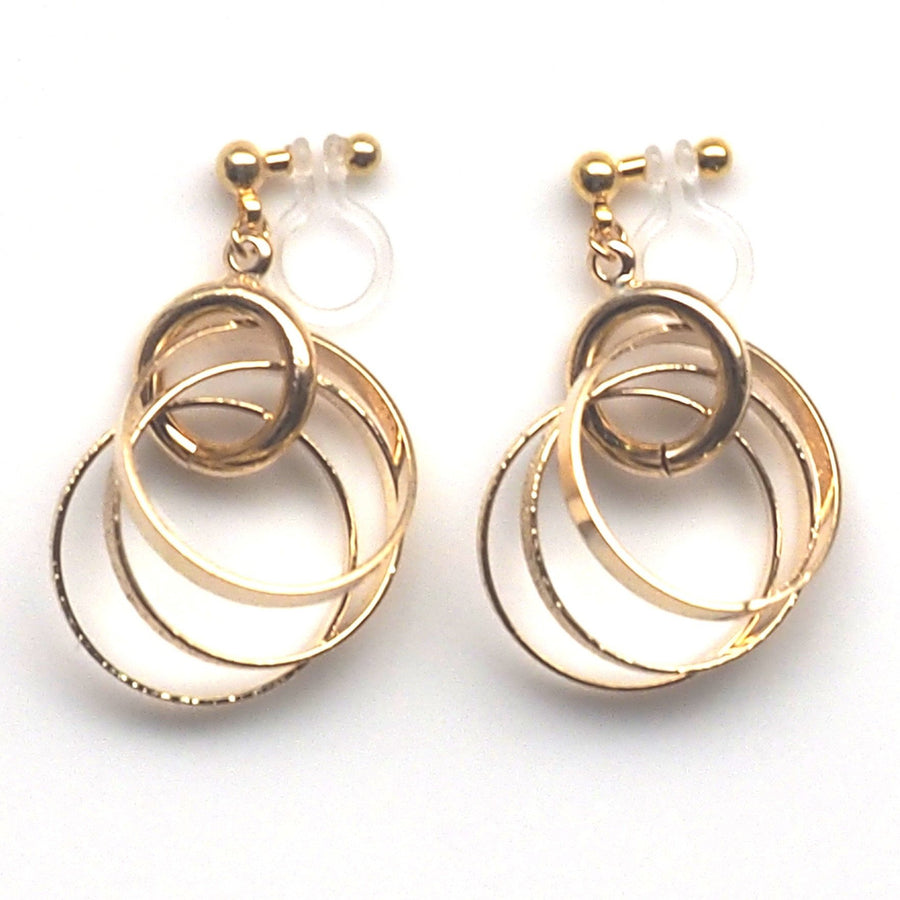 Three metallic gold rings invisible clip on earrings - miyabigracejewelry.com