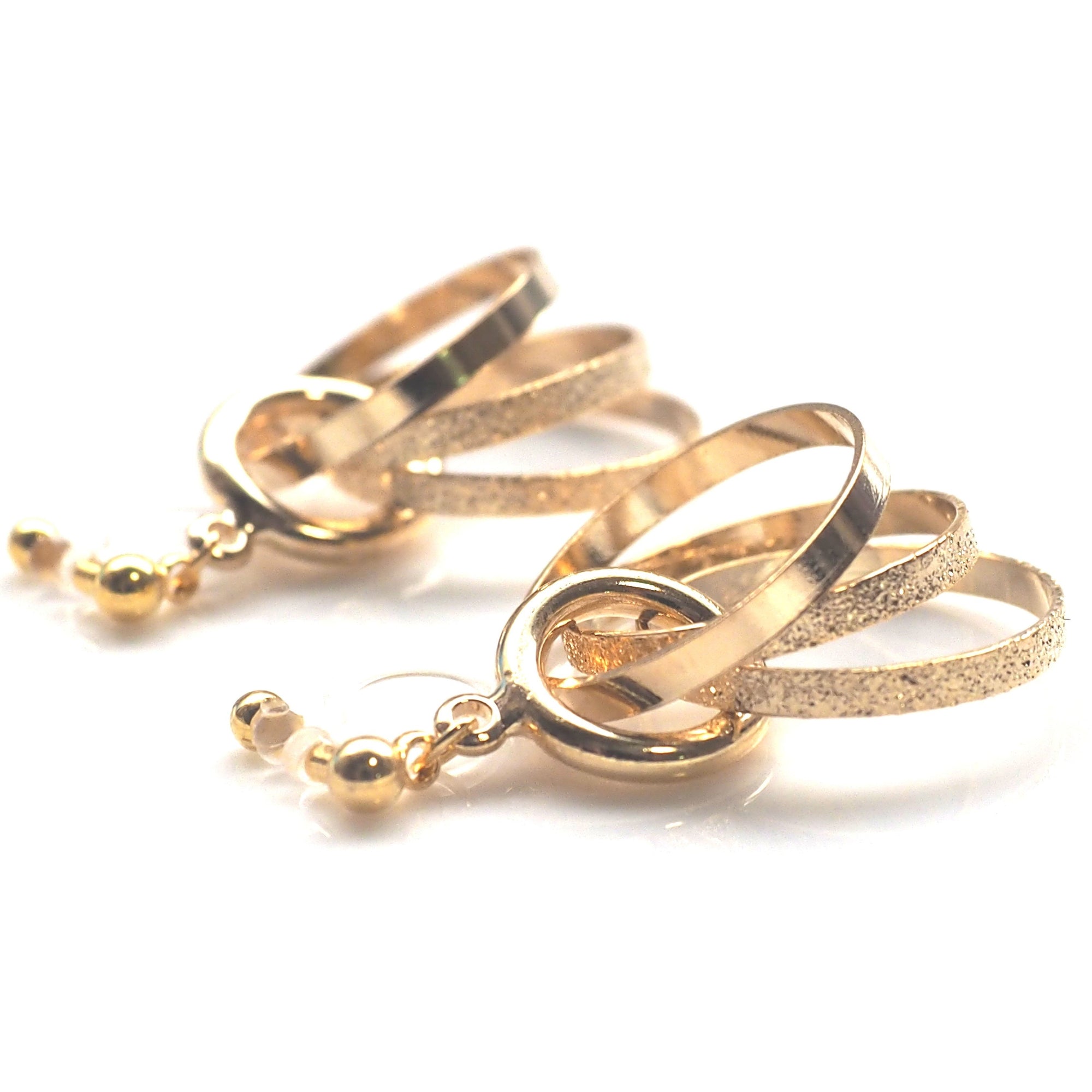 Three metallic gold rings invisible clip on earrings - miyabigracejewelry.com