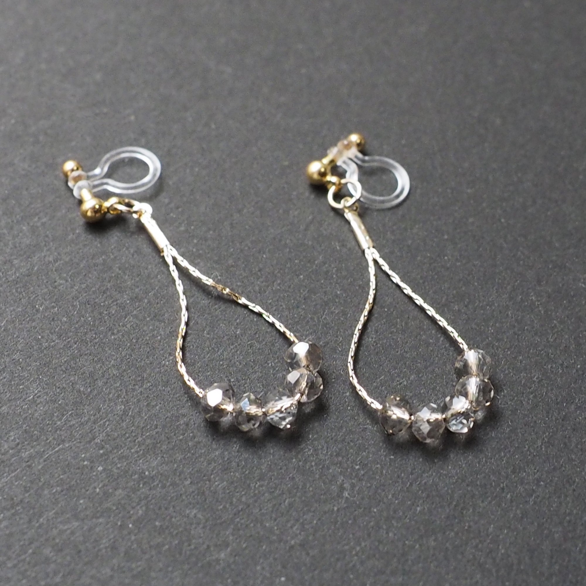 Dangle gray crystal & gold teardrop chain hoop invisible clip on earrings - Miyabi Grace