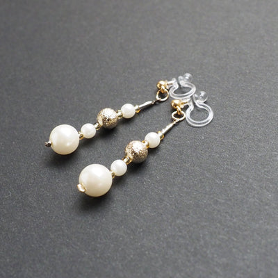 Dangle white pearls & metallic gold ball invisible clip on earrings - Miyabi Grace