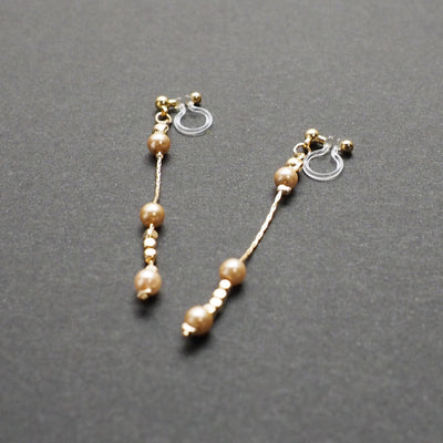 Dangle orange pearls & gold chain invisible clip on earrings - Miyabi Grace