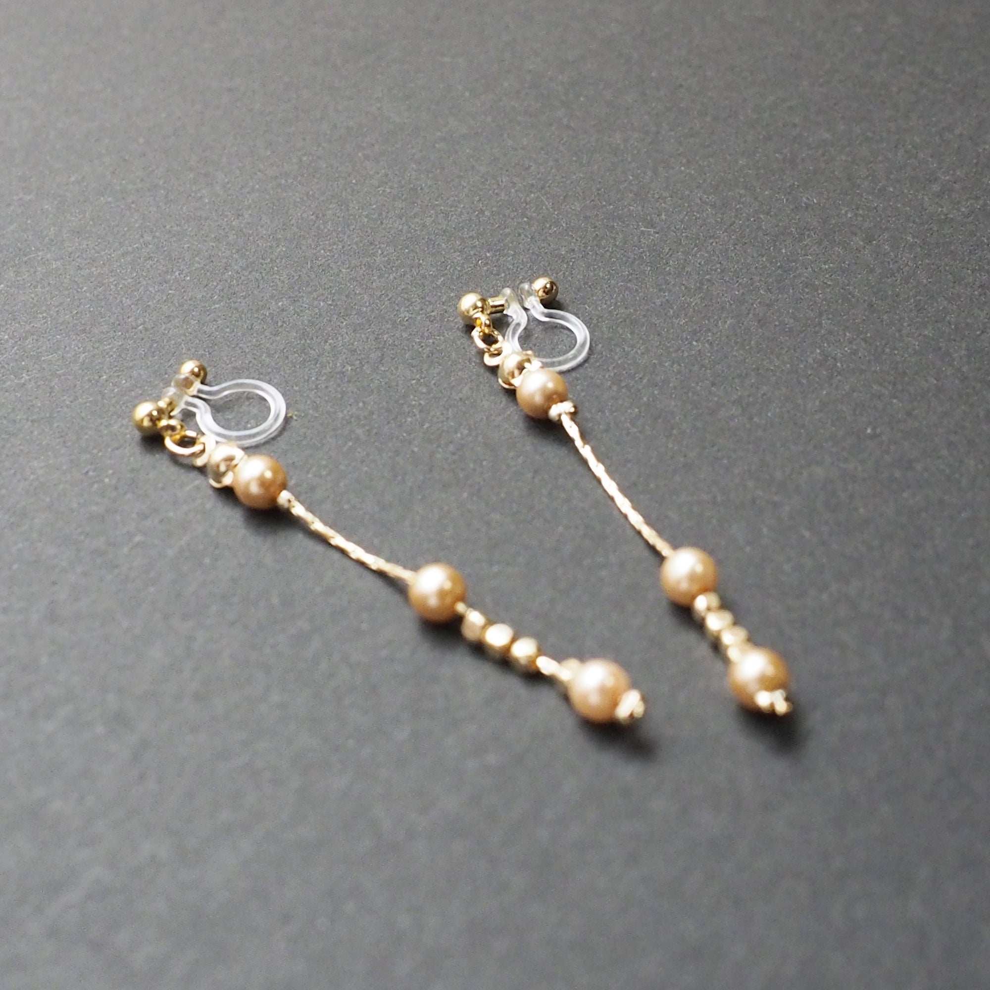 Dangle orange pearls & gold chain invisible clip on earrings - Miyabi Grace