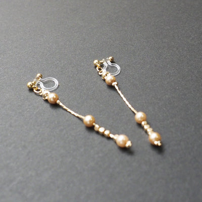 Dangle orange pearls & gold chain invisible clip on earrings - Miyabi Grace
