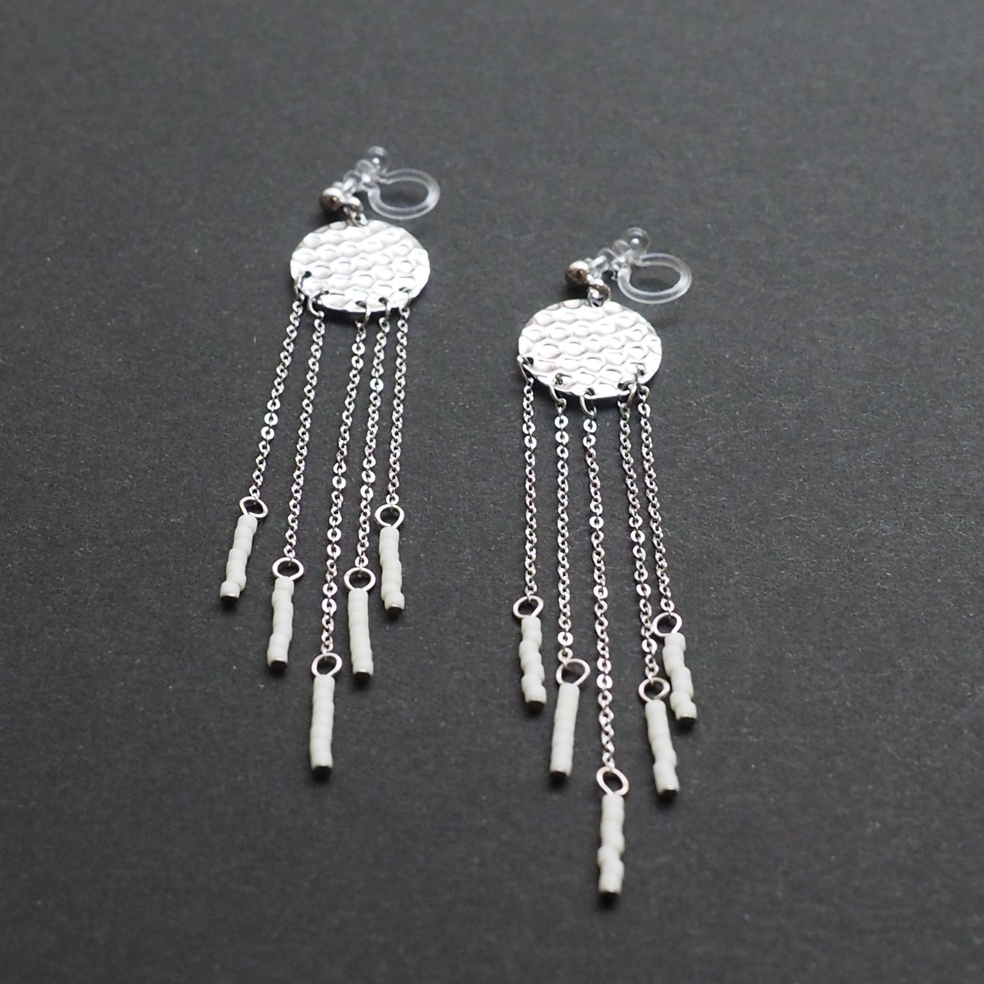 Hammered coin with white beads invisible clip on earrings ( Silver tone ) - Miyabi Grace