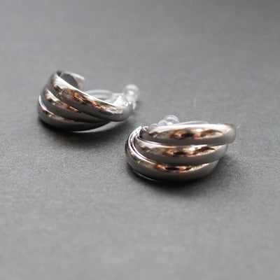 Silver Huggie Crossed Invisible Clip On Hoop Earrings - Miyabi Grace