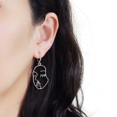 Silver human face clip on hoop earrings - Miyabi Grace