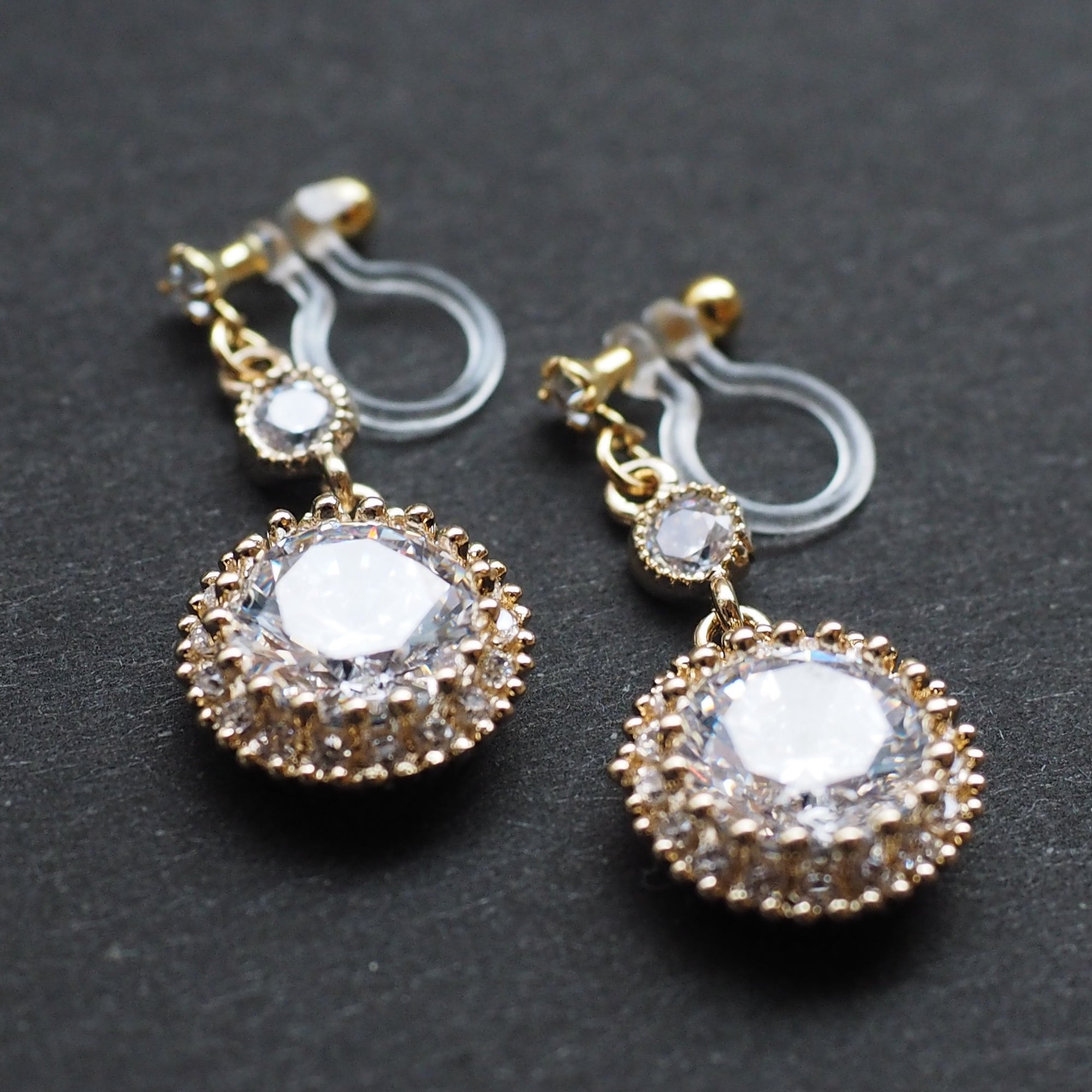 Round cubic zirconia invisible clip on earrings ( gold tone ) - miyabigracejewelry.com