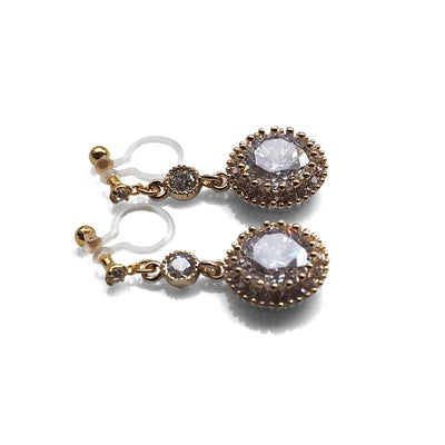 Round cubic zirconia invisible clip on earrings ( gold tone ) - miyabigracejewelry.com