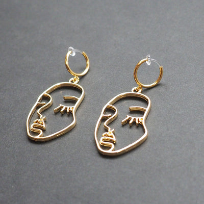 Gold human face clip on hoop earrings - Miyabi Grace