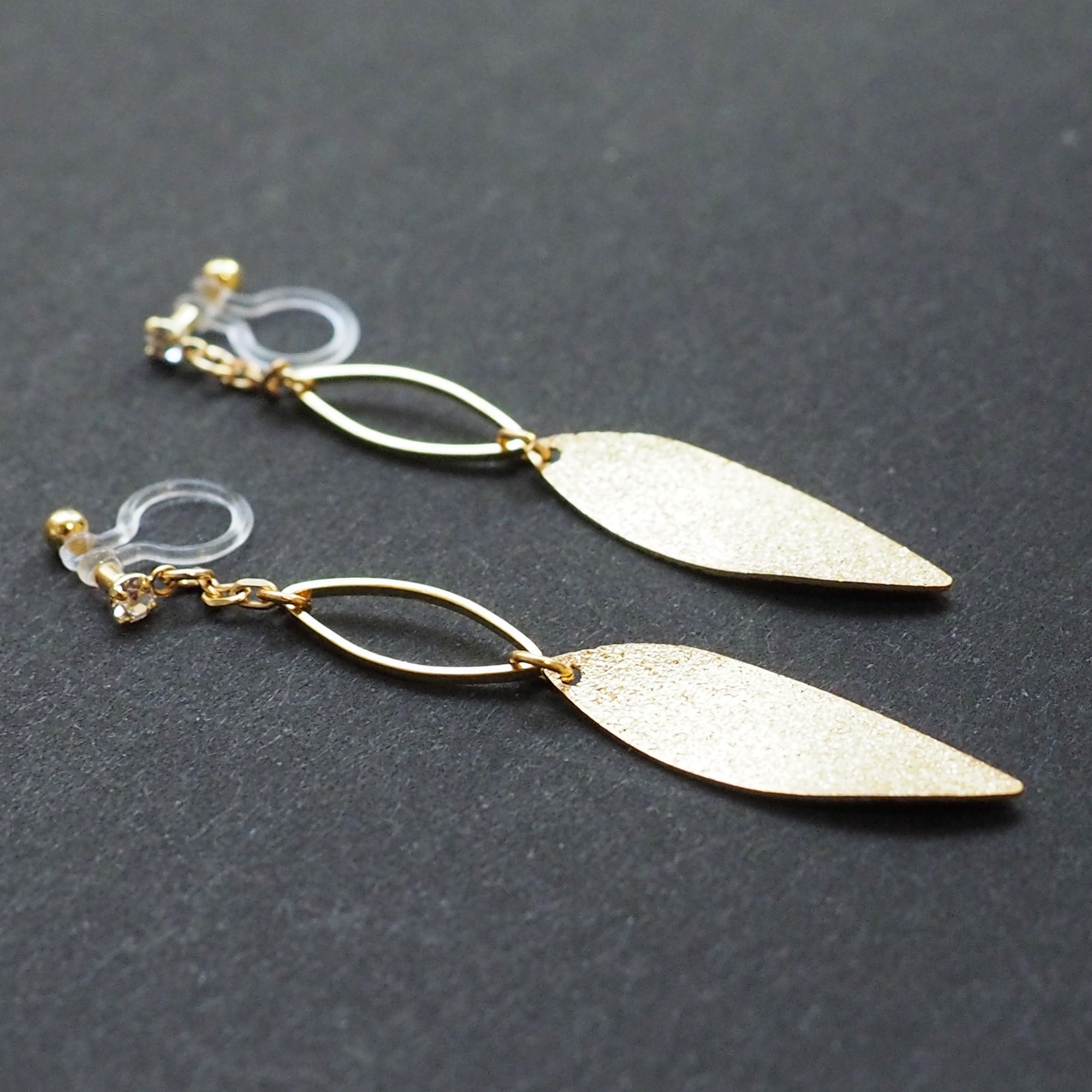 Gold textured metallic leaf invisible clip on earrings - miyabigracejewelry.com
