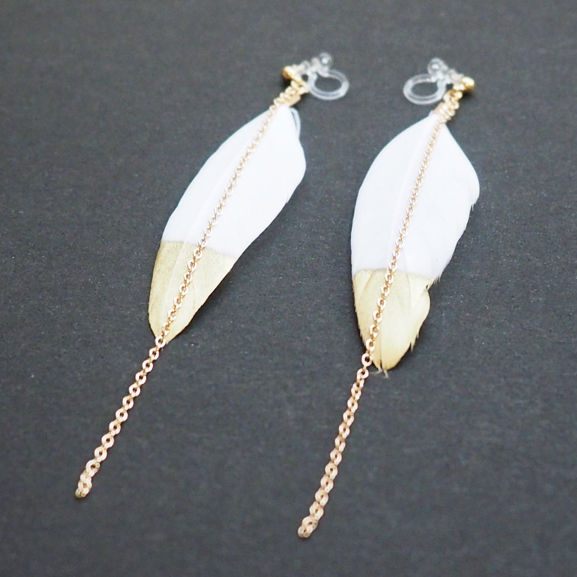 Gold painted white feather invisible clip on earrings - Miyabi Grace