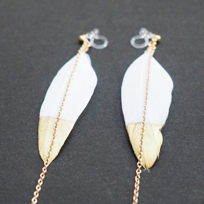 Gold painted white feather invisible clip on earrings - Miyabi Grace