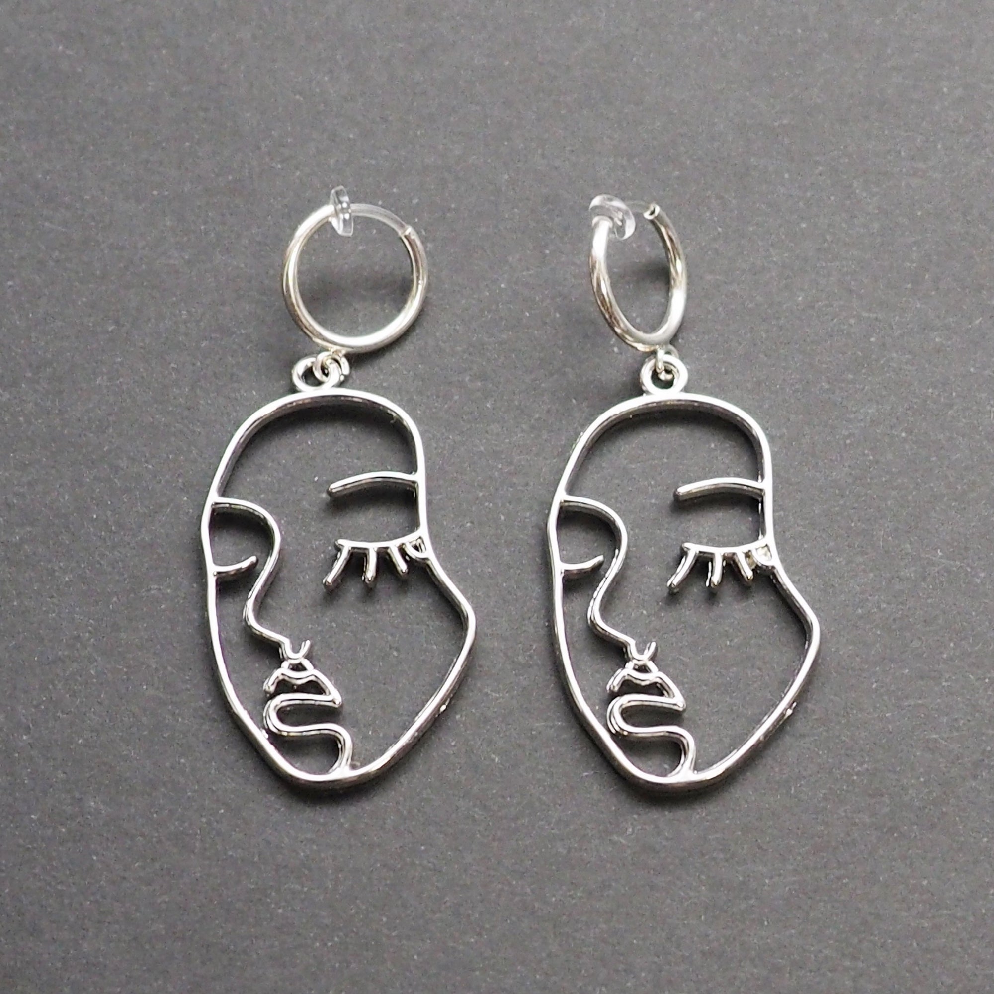 Silver human face clip on hoop earrings - Miyabi Grace