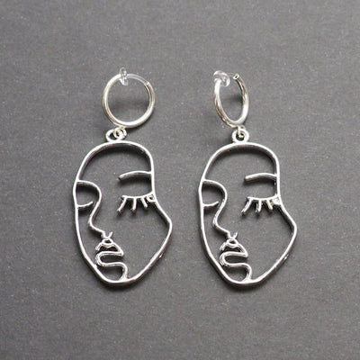 Silver human face clip on hoop earrings - Miyabi Grace