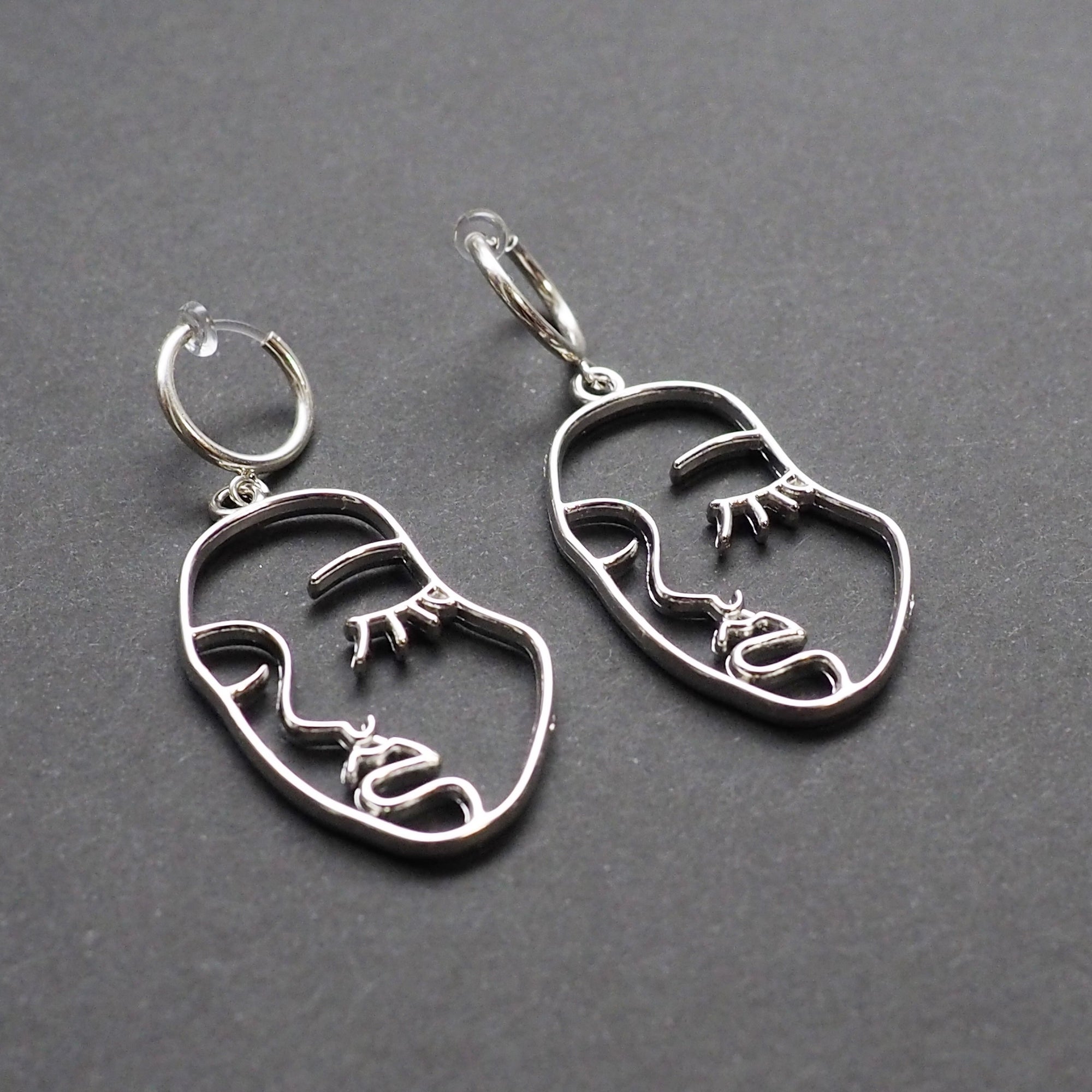 Silver human face clip on hoop earrings - Miyabi Grace