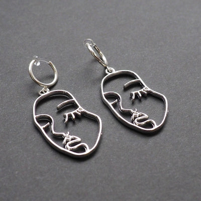 Silver human face clip on hoop earrings - Miyabi Grace