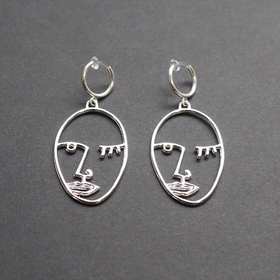 Silver Picasso human face clip on hoop earrings - Miyabi Grace