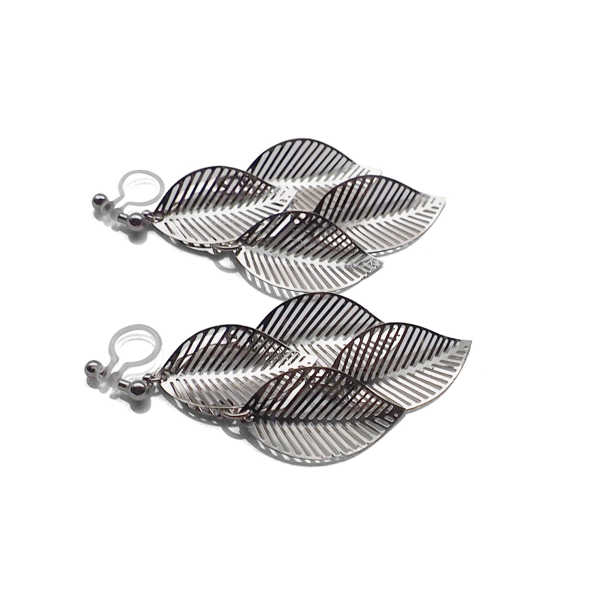Silver four leaf filigree invisible clip on earrings - miyabigracejewelry.com
