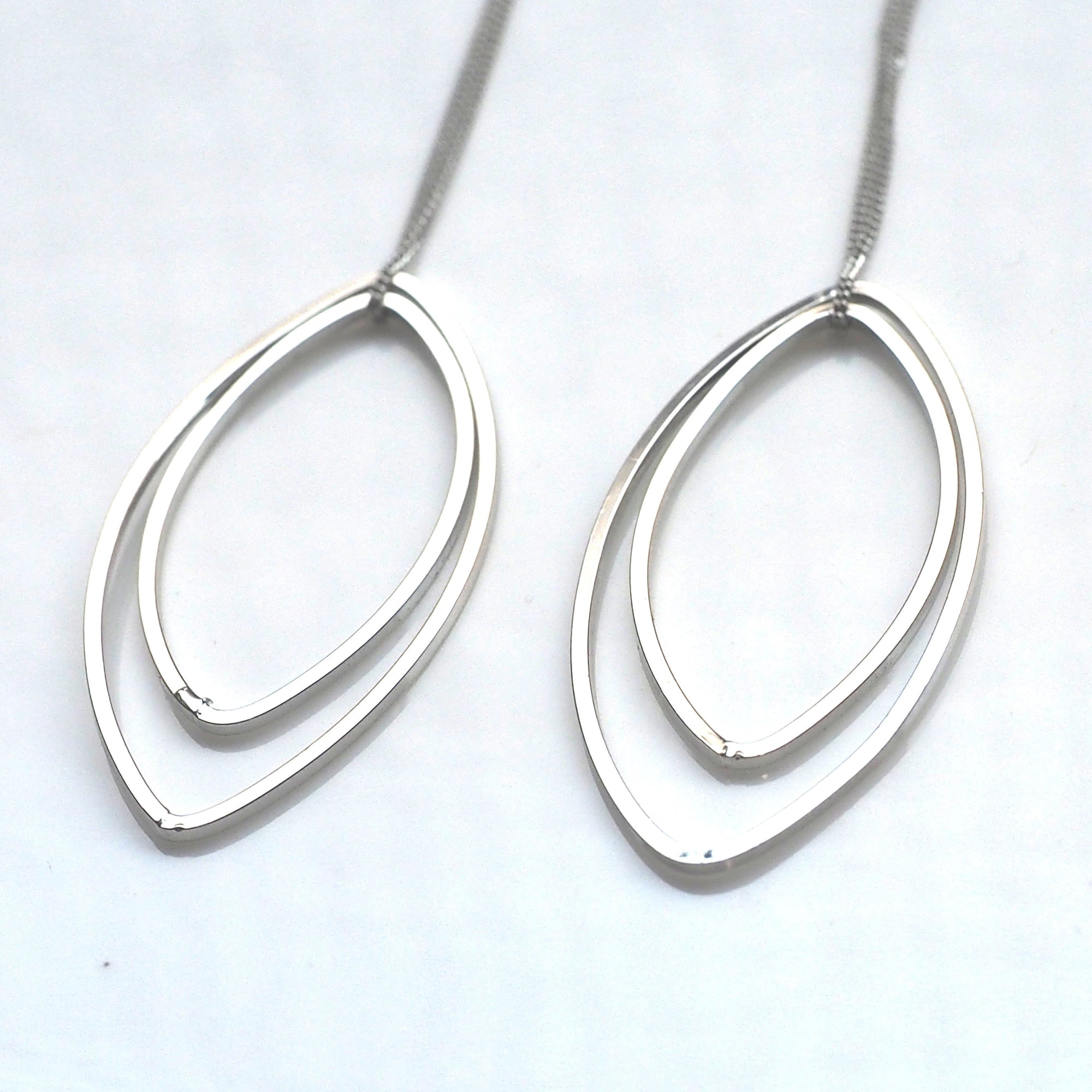 Dangle silver double oval hoop invisible clip on earrings - miyabigracejewelry.com