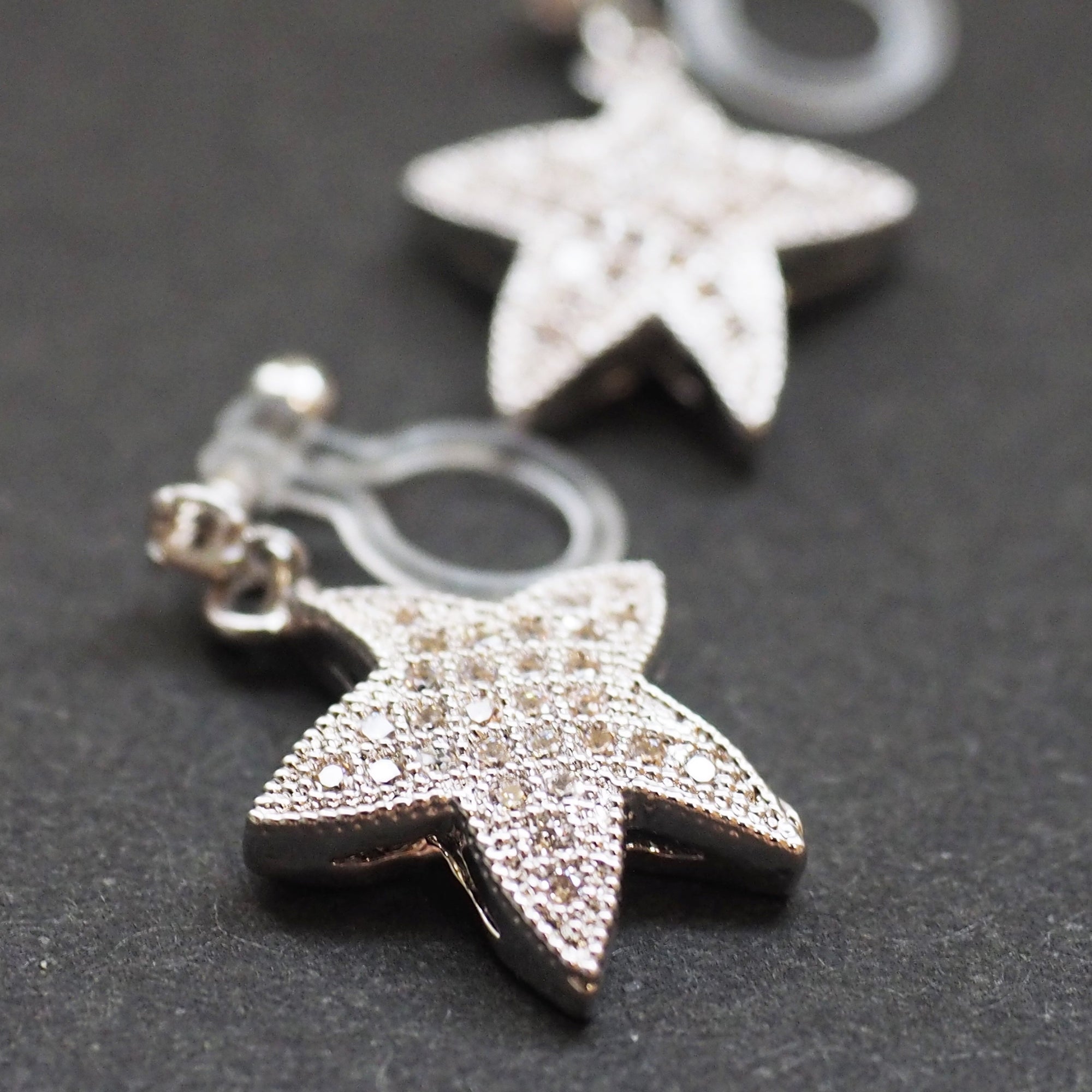 Star micro pave cubic zirconia invisible clip on earrings ( silver tone ) - miyabigracejewelry.com