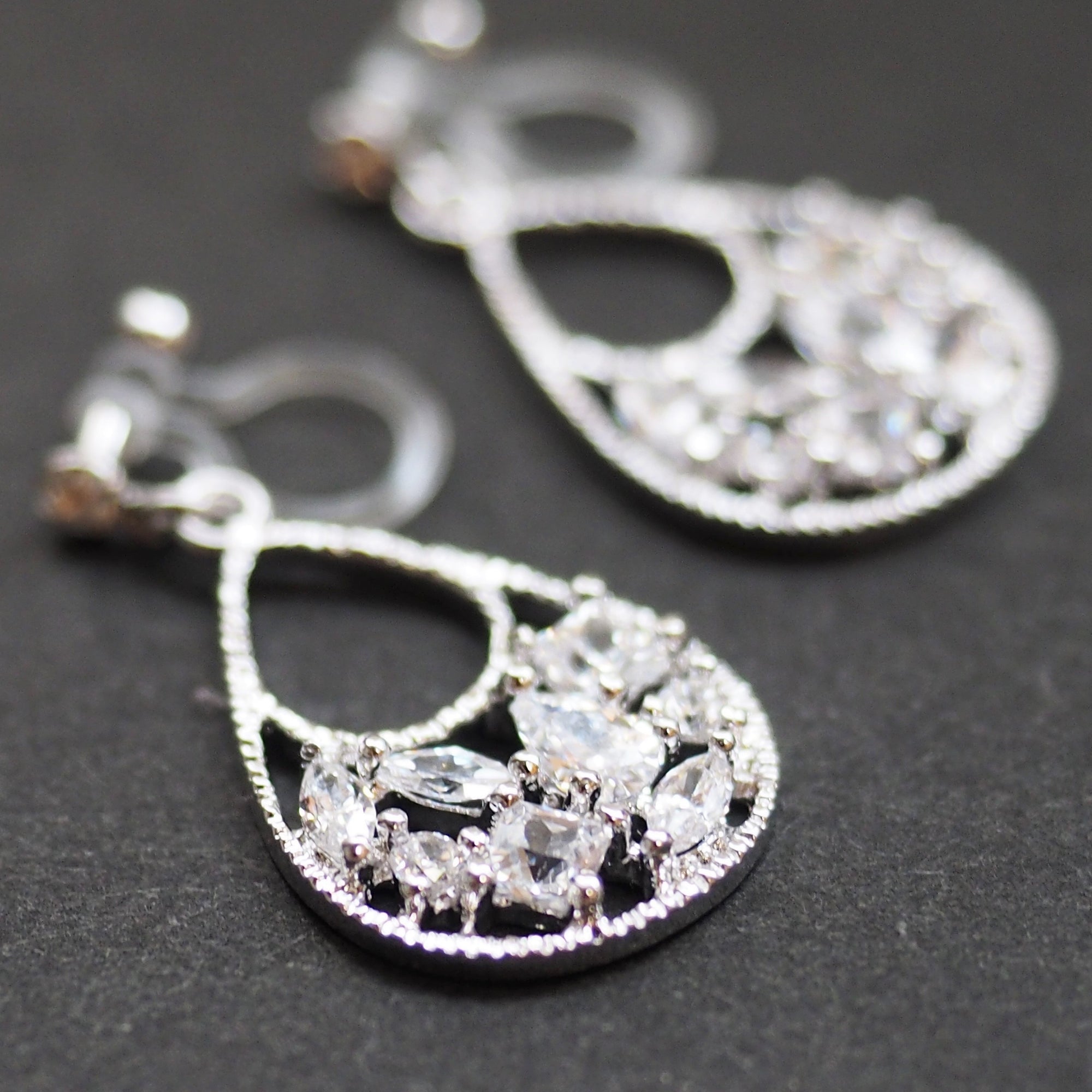 Teardrop filigree cubic zirconia invisible clip on earrings (silver tone) - miyabigracejewelry.com