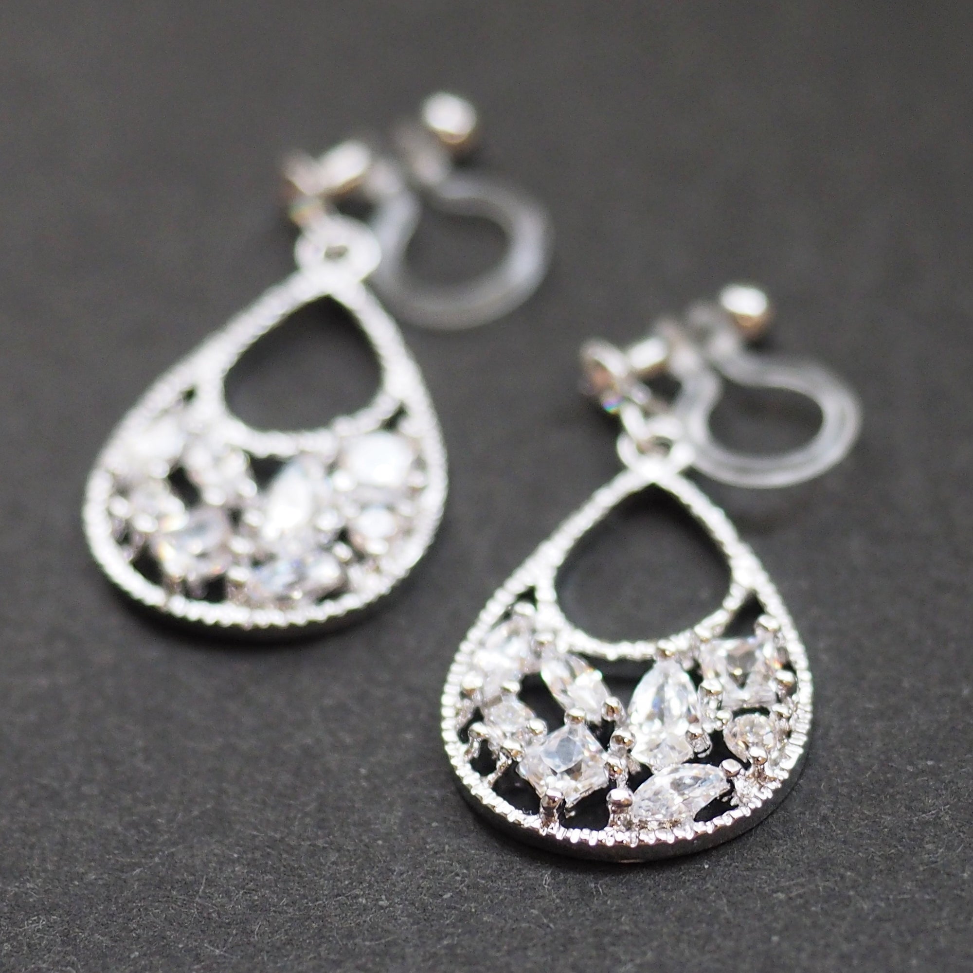 Teardrop filigree cubic zirconia invisible clip on earrings (silver tone) - miyabigracejewelry.com