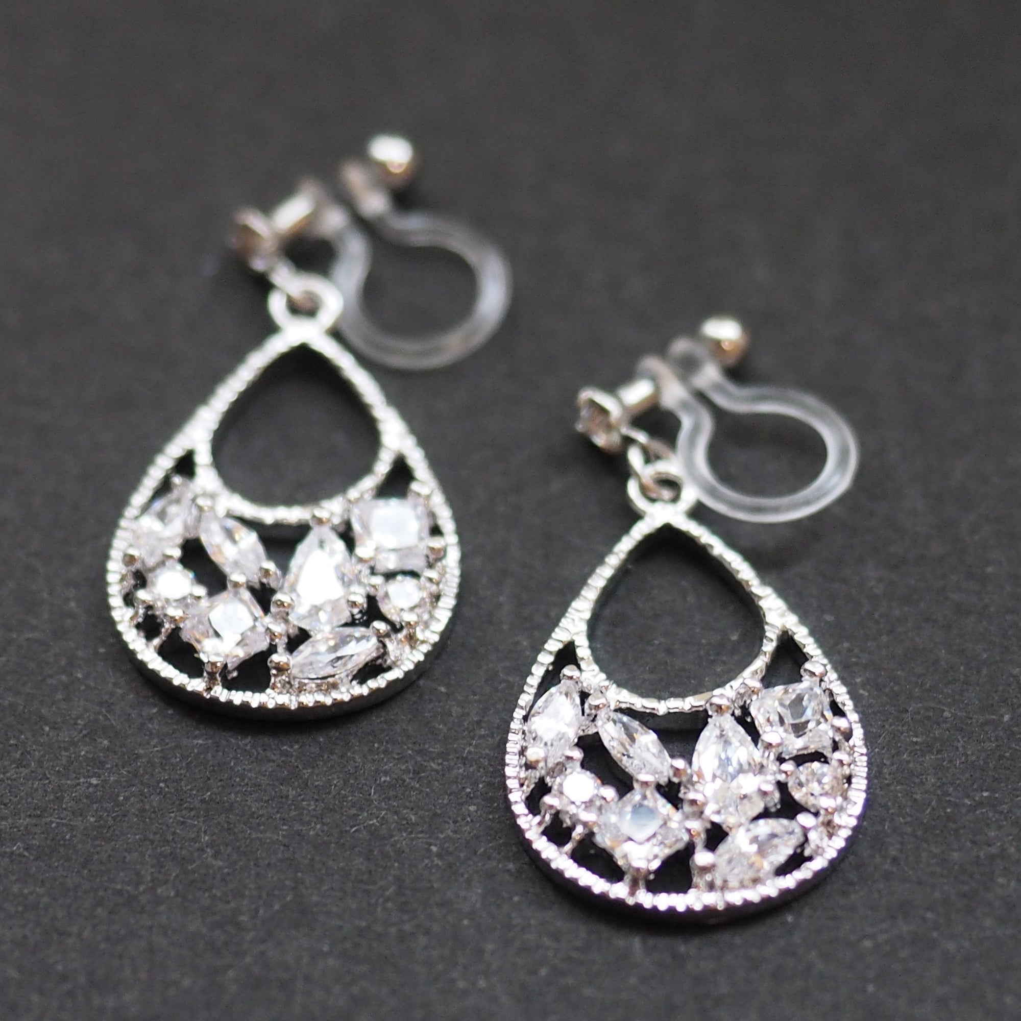 Teardrop filigree cubic zirconia invisible clip on earrings (silver tone) - miyabigracejewelry.com