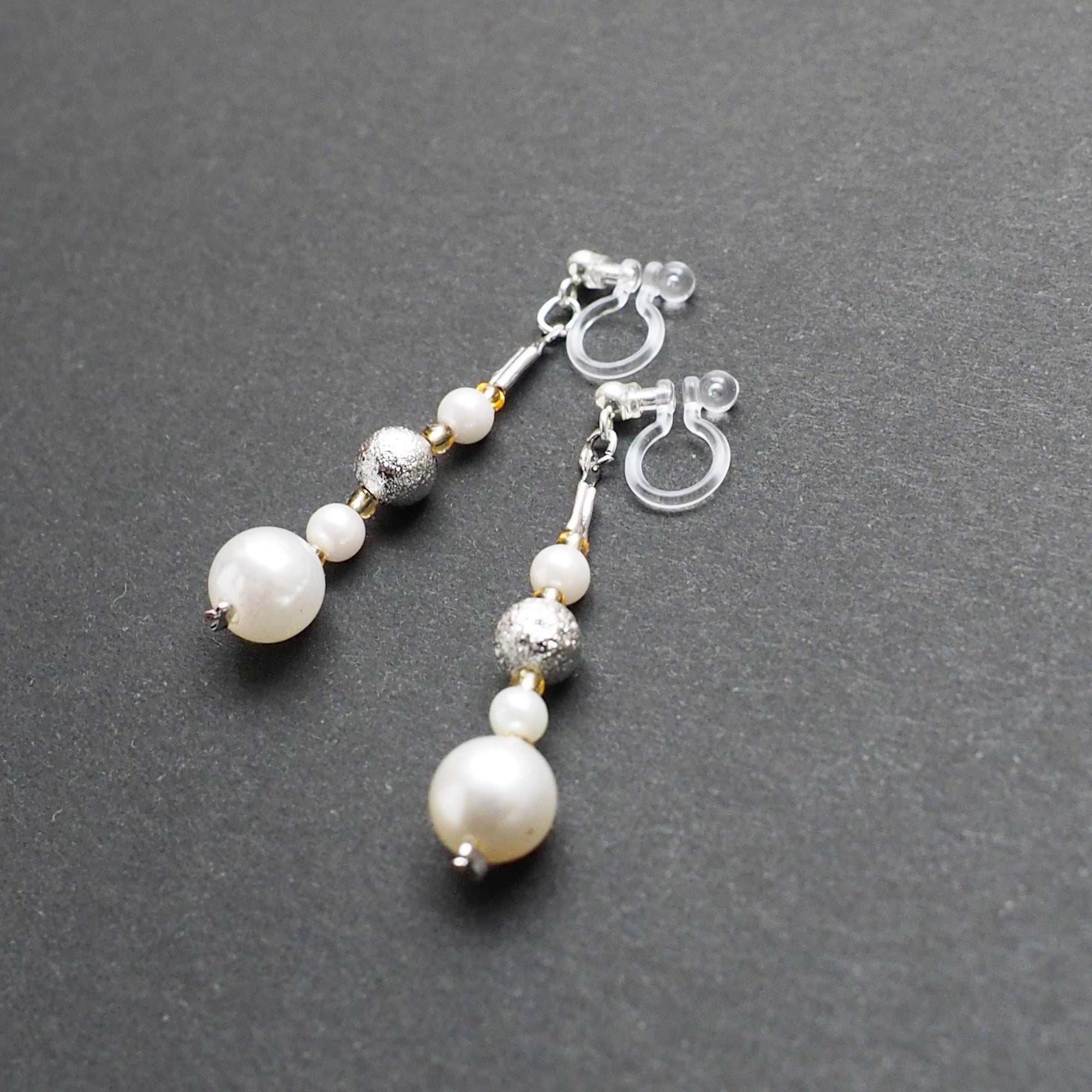 Dangle white pearls & metallic silver ball invisible clip on earrings - Miyabi Grace