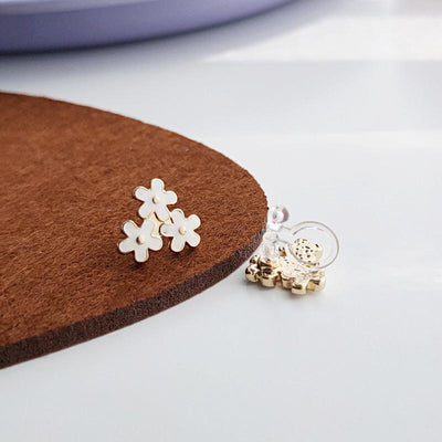 White Three Small Flowers Invisible Clip On Earrings