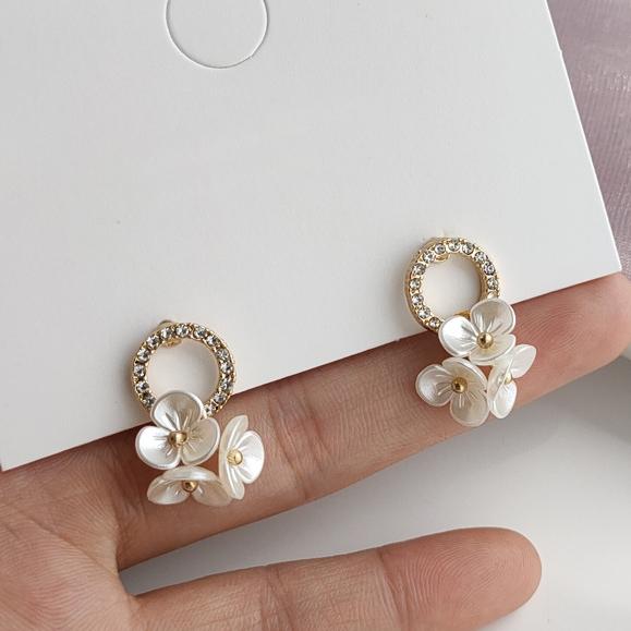 Crystal Rhinestone Pave With White Flower Invisible Clip On Earrings