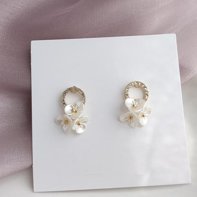 Crystal Rhinestone Pave With White Flower Invisible Clip On Earrings