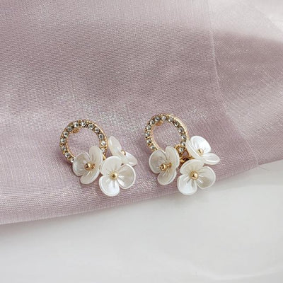 Crystal Rhinestone Pave With White Flower Invisible Clip On Earrings