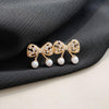White Pearl Ribbon Bow Tie Crystal Rhinestone Pave Invisible Clip On Earrings