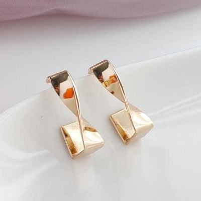 Twisted Gold Hoop Invisible Clip On Earrings