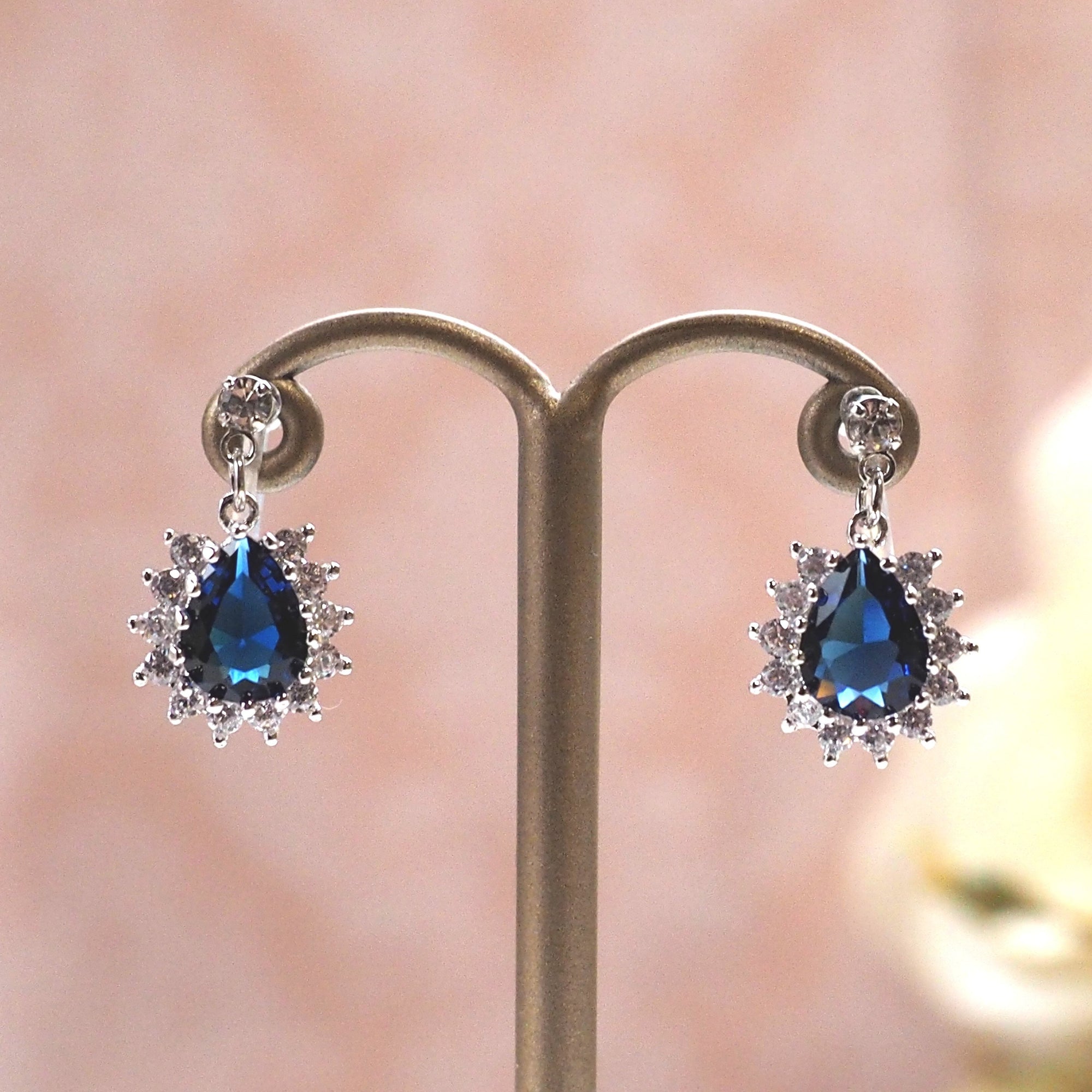 Teardrop navy blue cubic zirconia invisible clip on earrings ( silver tone ) - miyabigracejewelry.com