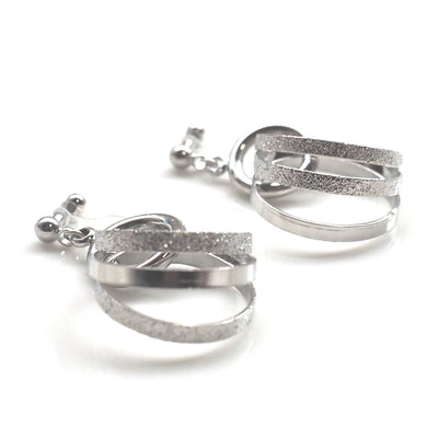 Three metallic silver rings invisible clip on earrings - miyabigracejewelry.com